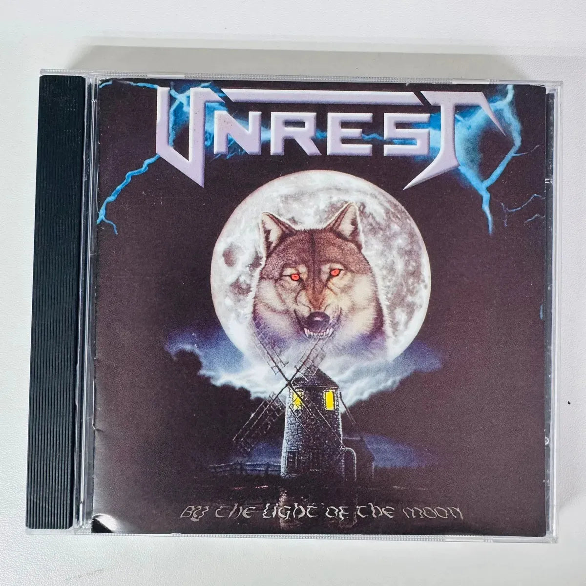 Cd Unrest - By The Light Of The Moon [importado]