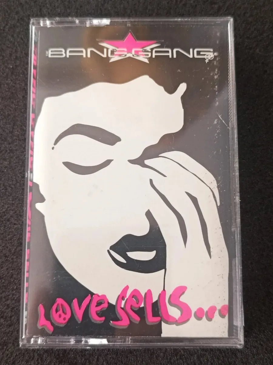 K7 Cassete - The Bang Gang - Love Sells... * Us - Heavy 1990