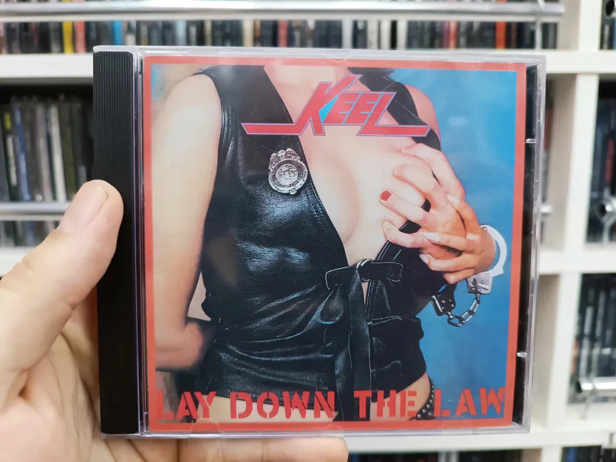 Cd Keel - Lay Down The Law * Imp - Heavy Metal