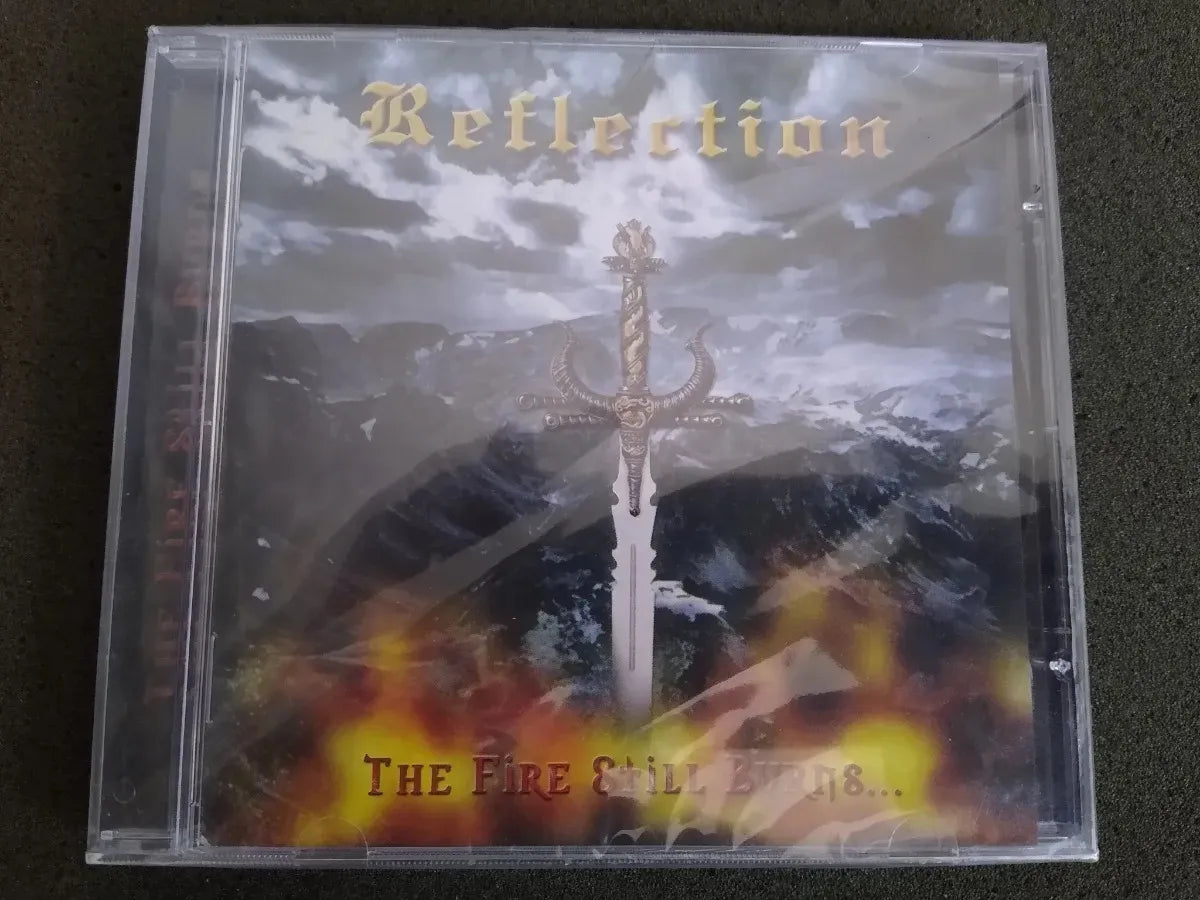 Cd - Reflection  The Fire Still Burns *new - Imp - Heavy