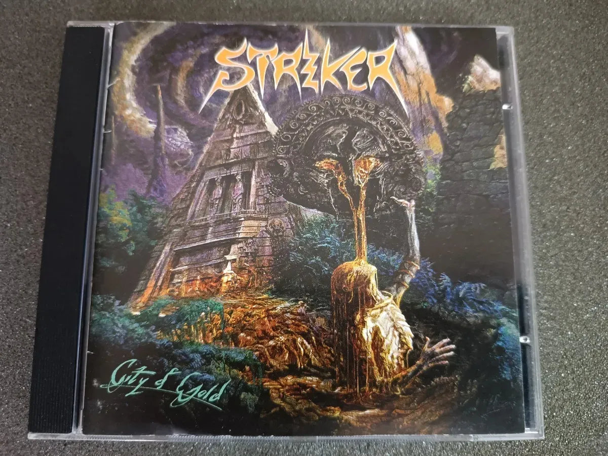 Cd - Striker - City Of Gold C/bonus * Imp - Heavy Metal