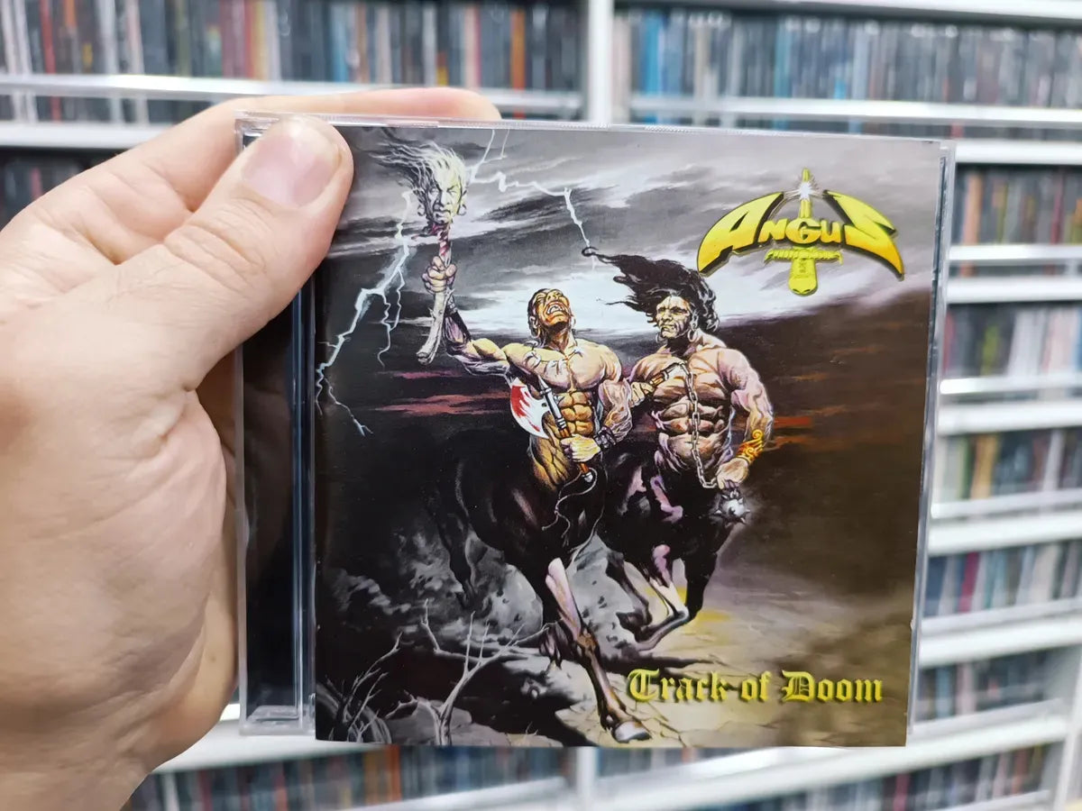 Cd Angus - Track Of Doom * Nac - Heavy Metal